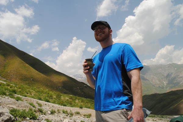 Ryan drinking in tajik mountains