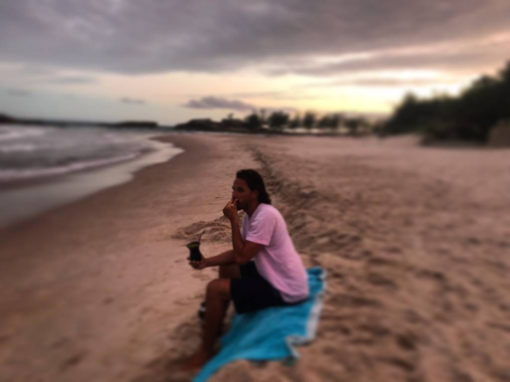 Enjoying a delicious mate on the beach